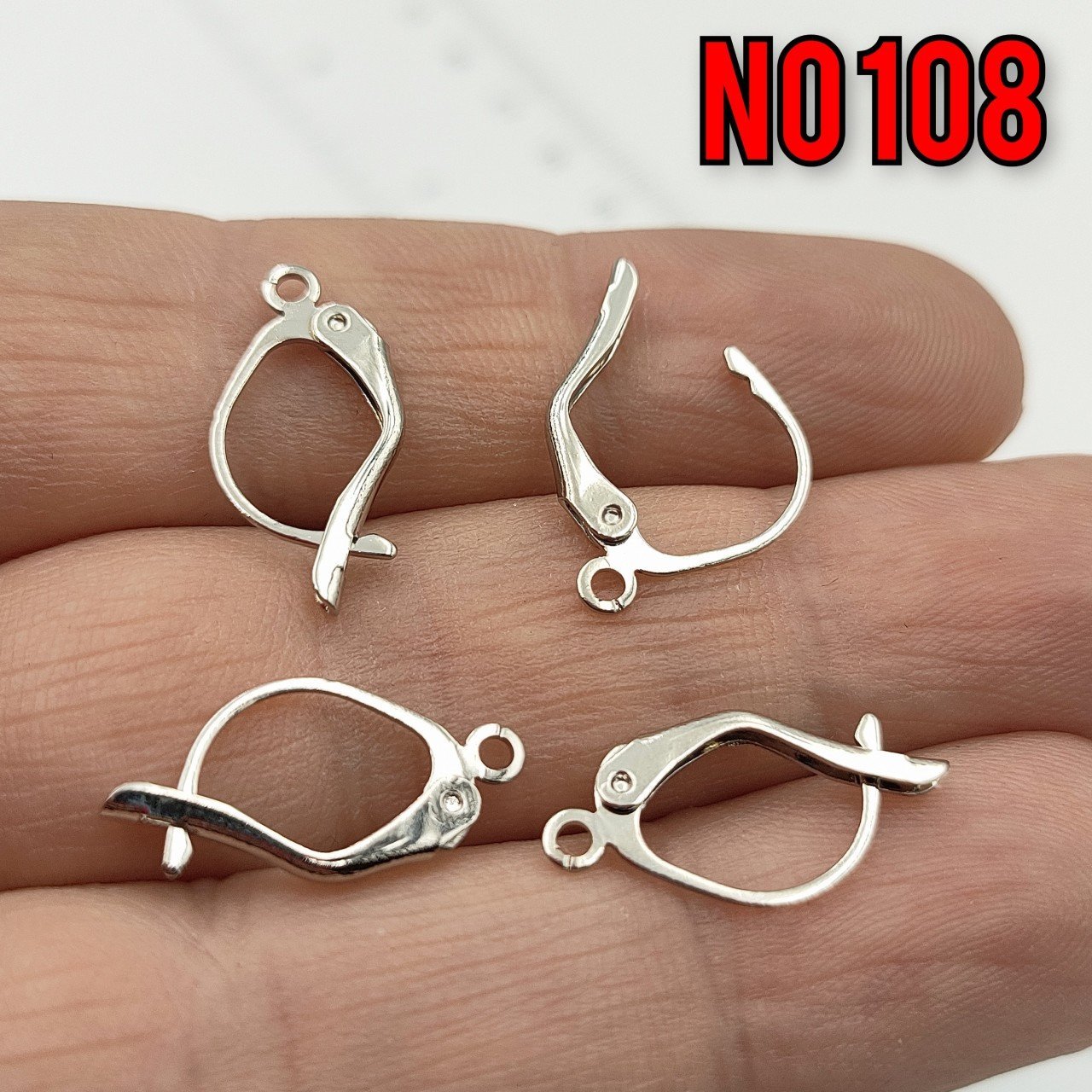 No : 108 Rodyum Kaplama Pirinç Küpe Klips 15 x 9 mm